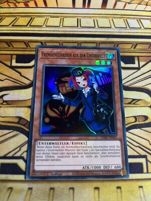 Yugioh Fremdenführerin aus der Unterwelt RA01-DE005 Super Rare