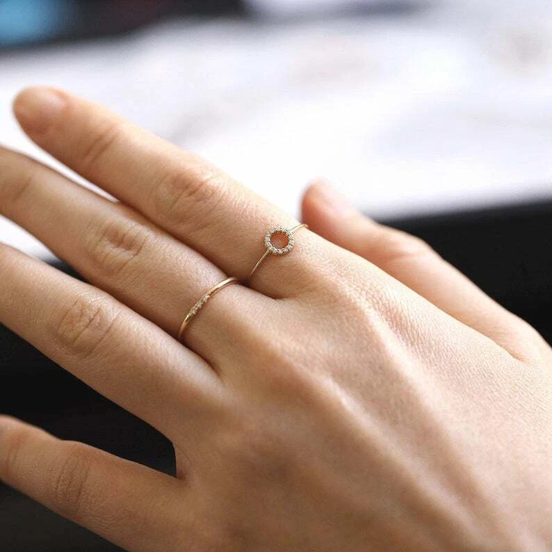 Ring with open sale circle