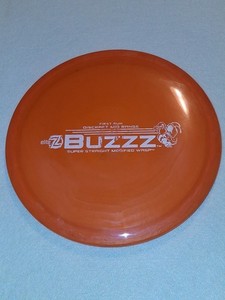 Disque Discraft Elite Z Buzzz – Midrange Orange 174g – Bar Stamp