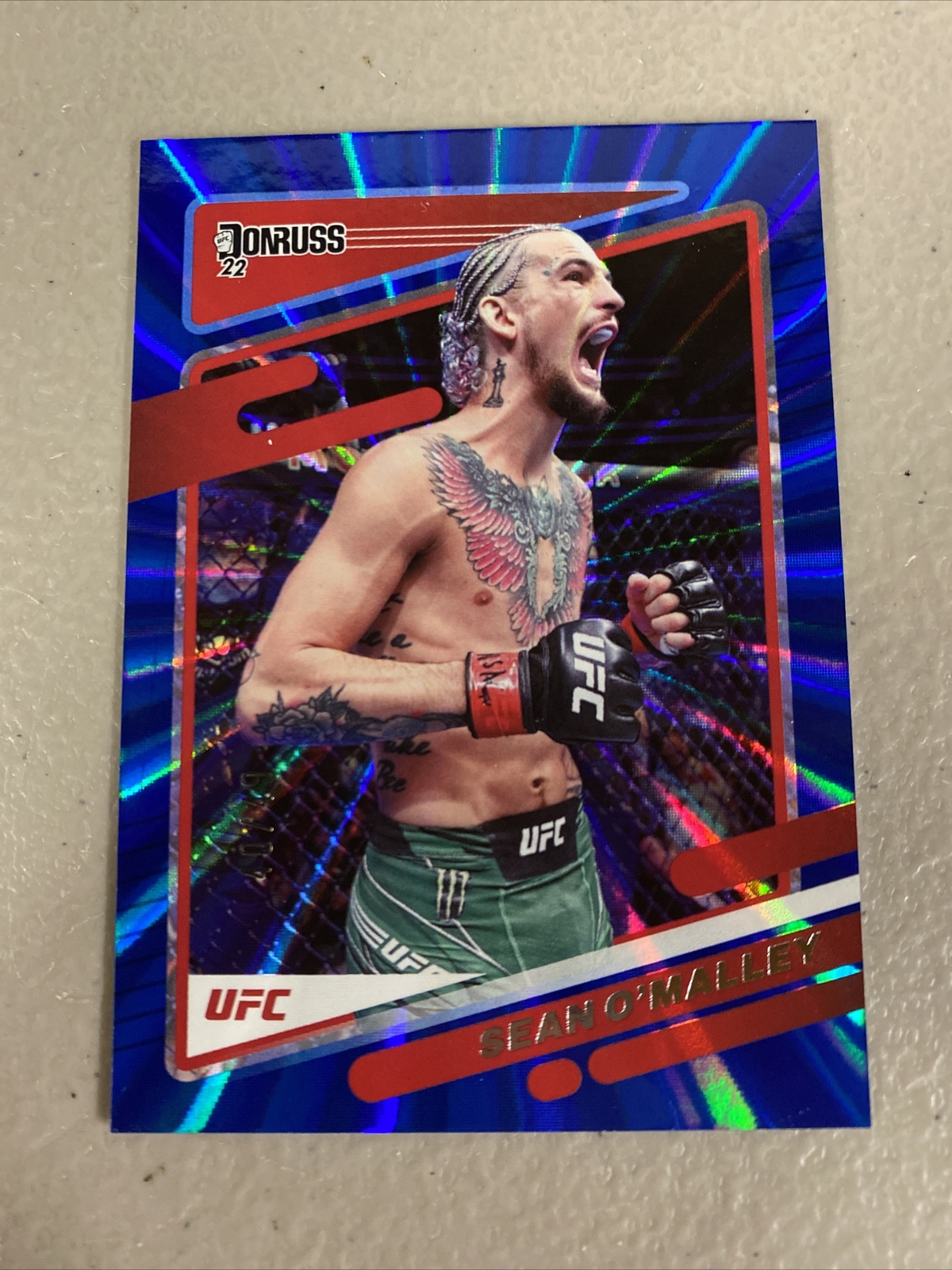 2022 Donruss UFC Sugar Sean O'Malley Holo Blue Laser SSP /49