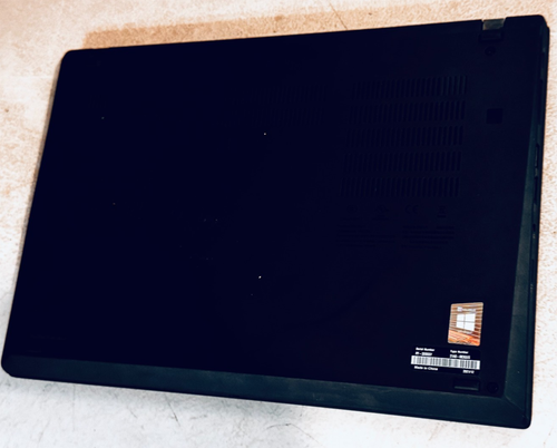 Black Lenovo ThinkPad P14S Gen 2 Touch 8-core Ryzen 7 Pro 5850U with visible rear camera, heat sinks, and printed specifications.
