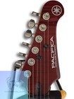 Yamaha Electric Guitar PAC612VIIFM with gold & black body, silver hardware, and “PACIFIC CAVES” logo on head.