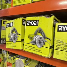 RYOBI "4" HAND HELD TILE SAW.