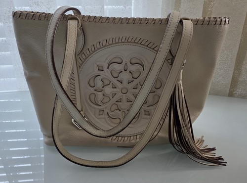 BRIGHTON FERRARA COLL. GABRIELLA WINTER WHITE MEDALLION TASSELED TOTE PURSE