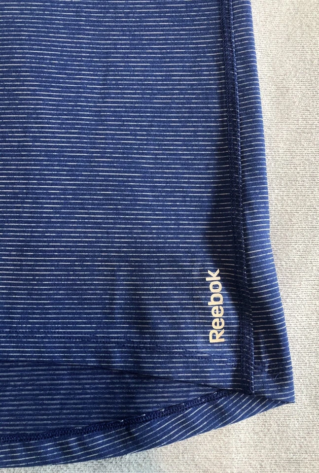 Camiseta sin mangas deportiva Reebok azul a rayas cuello en V entrenamiento poliéster para mujer S pequeña Foto 4 de 4