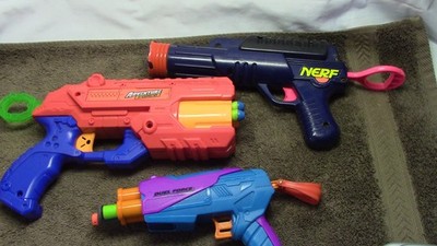 Three Child's toy Nerf like toys All work