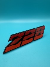 Nos 1980 1981 Chevrolet Camaro Front Grille Emblem Tri Color Red 14013868