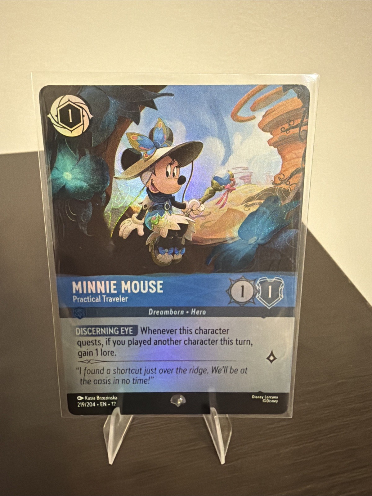 Minnie Mouse - Practical Traveler (Epic) 219/204 Wilds Unknown Holo