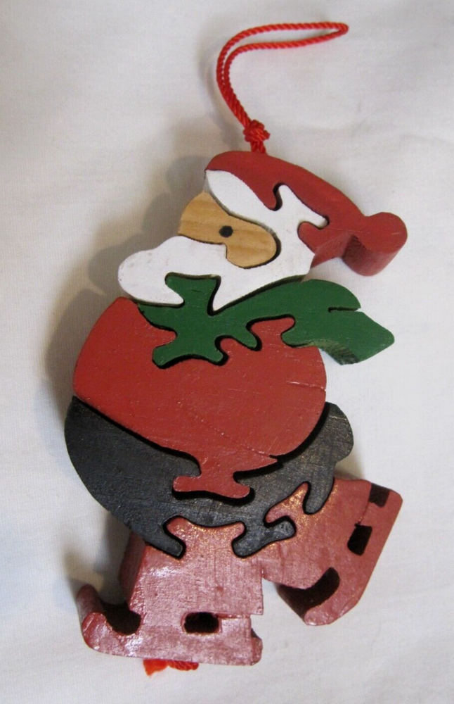 Vtg Wood Christmas Jigsaw 7 Puzzle pieces Santa Claus on skies hanging Ornament