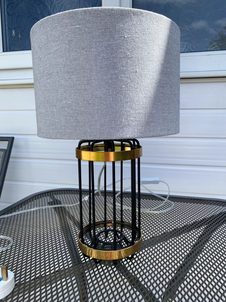 Small black 2024 and gold lamp