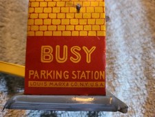 VINTAGE LOUIS MARX CLOCKWORK TIN LITHO BUSY PARKING STATION W/ CAR