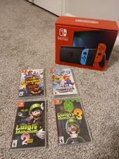 Nintendo Switch Console with Super Mario Bros. Wonder, 3D World, Luigi's Mansion
