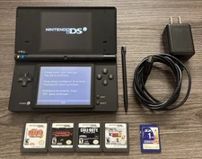 Nintendo DSi Black Handheld System Bundle w/ Charger, 4 Games, & 1GB SD Card