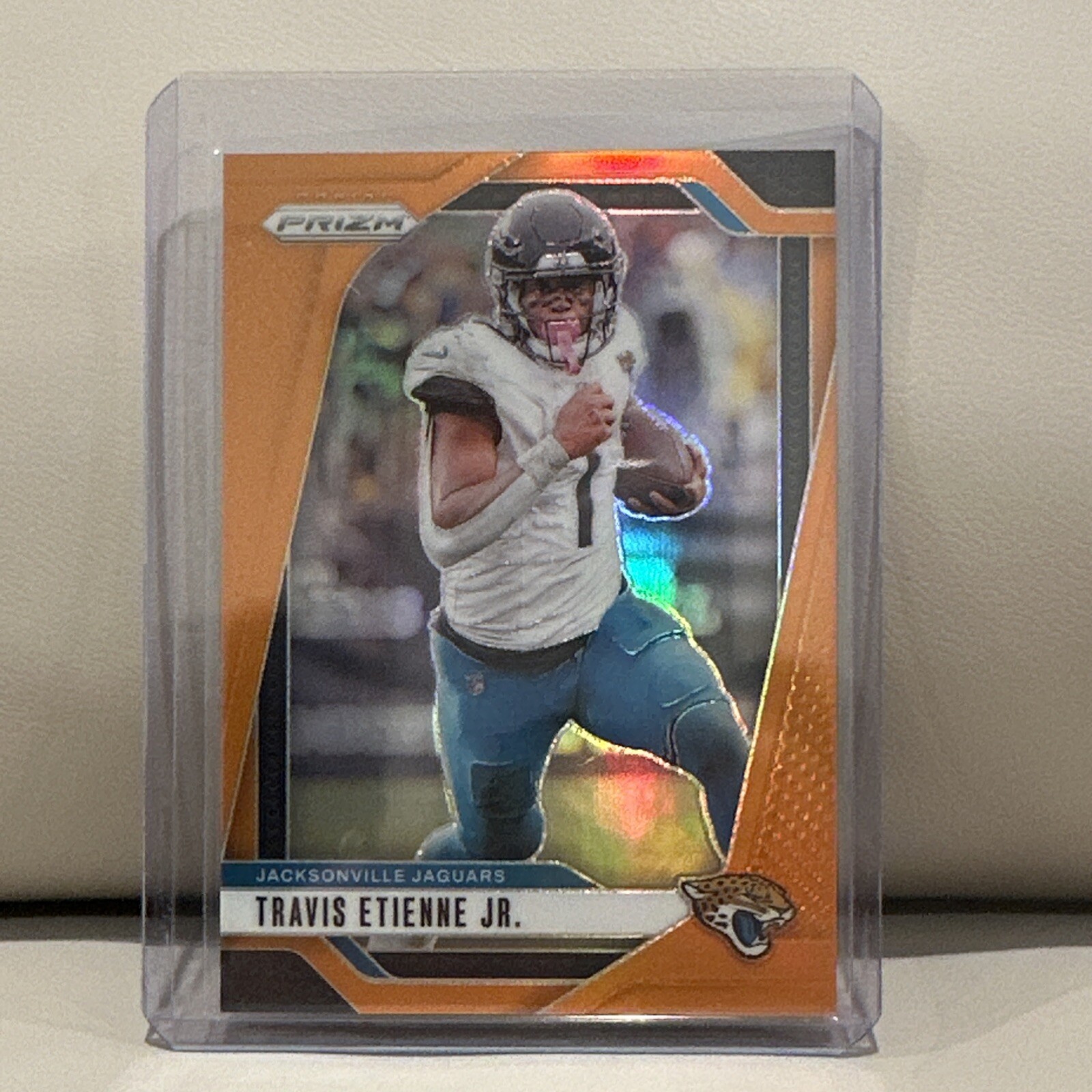 2024 Panini Prizm Football Travis Etienne Jr. Orange Prizm /249 Jaguars #130