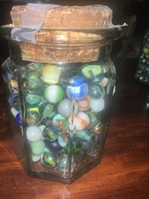 Old Marbles In Antique Jars 