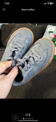 H&M Casual Sneakers featuring a dark grey design with gum soles