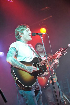 Brian Fallon of rock band The Gaslight Anthem performing on stage - Old Photo
