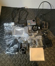 Akaso V50 Elite used with 2 Batteries +charger.Micro sd card + accessories shown