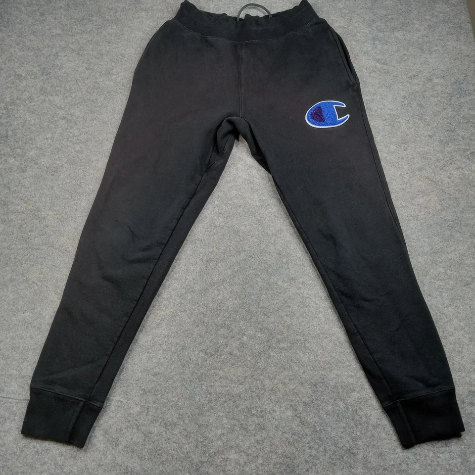 Pantalones deportivos Champion para hombre medianos negros tejido inverso parche grande C atlético Foto 2 de 4