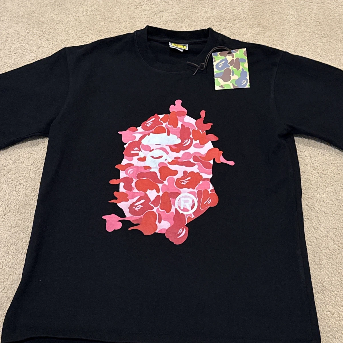 Preços baixos em Camisas masculinas rosa tamanho S A Bathing Ape