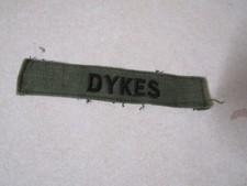 MILITARY PATCH US ARMY NAME TAPE OD GREEN COMBAT USED WITH NAME DYKES