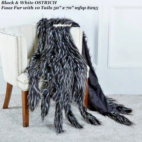 Manta de tiro blanco y negro de piel sintética de avestruz con 10 colas 50" x 70" mfsp $295 Foto 2 de 2