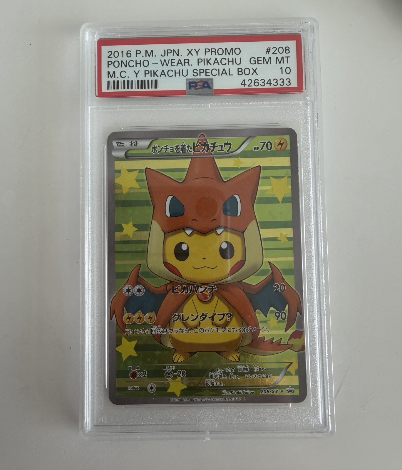 2016 Pokemon Japanese XY Promo 208 Poncho-Wearing Pikachu Charizard PSA 10