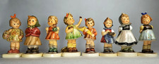 A Lovely Set of 8 Hummel Germany Polychrome Porcelain Girl Figurines