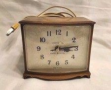 VINTAGE General Electric Alarm Clock Plastic wood grain Made in USA