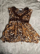 Vintage-inspired brown and tan babydoll dress with ruffles