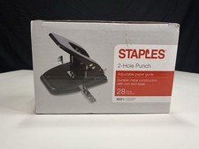 Staples 2-hole punch 28-sheet capacity Box was opened but contents are sealed