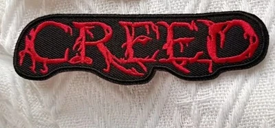 1pce Creed Iron On /sew on Embroidered Patch 11.5x3.3cm - Image 1 of 2