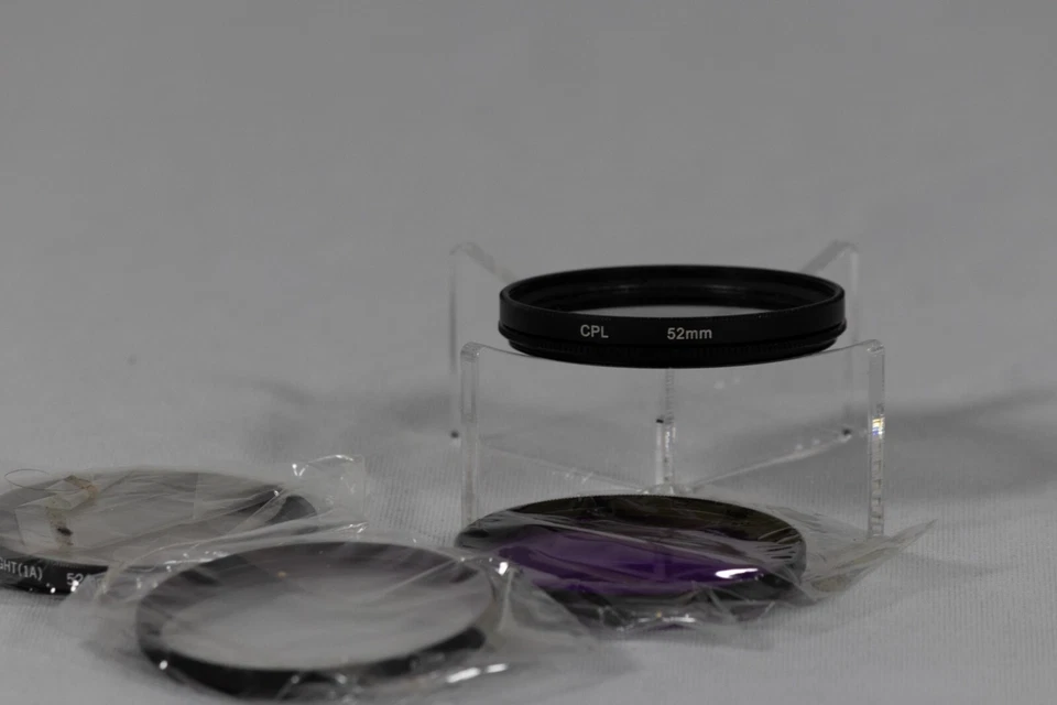 Neewer filter pouch w purple FLD 52mm, TOYO UV 52mm, UV 52mm, CPL 52mm orange - Image 2 of 4