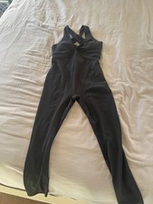 PureLuxe by Fabletics Women s bodysuit in Large color Black. Fits true to size.