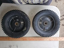 24NN22 WHEELS FROM PRESSURE WASHER: 8" X 2" X 1/2" +/-, SHOULDER IS 1/4" PROUD