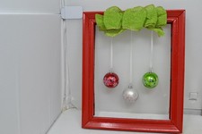 Christmas Tree Ornaments Hanging as a Photo in a Picture Frame Wall Hanging