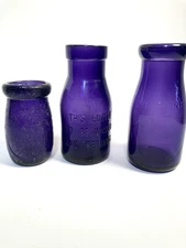 3 Milk bottles, 2 round HALF PINT, one fourth pint, purple, irradiated,