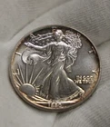 1990 US Silver Eagle $1 Nice Unc Edge Toning