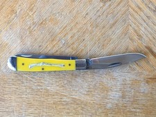 Whitetail Cutlery Large Yellow Trapper Pocket Knife with Civil War Musket Inlay