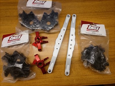 losi super baja rey aluminum hub carriers, trailing arms & 3 bulkheads LOS252074