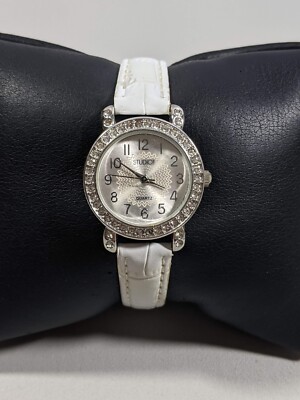 Studio Silver Tone Dial Round Crystal Accent Case 26 mm White Faux Leather Watch