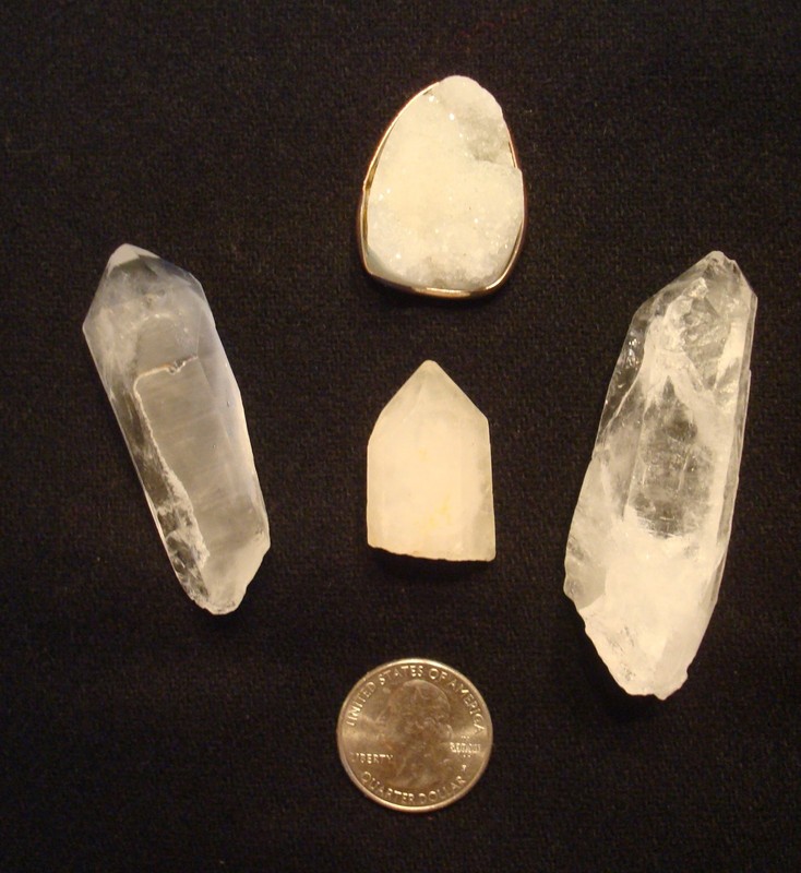Quartz crystals, includes a white geode crystal slice in a metal setting