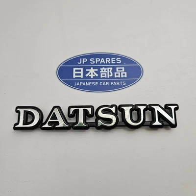 NOS Nissan Datsun 100A E10 Cherry Emblem 78801-M0960 Genuine 483 - Bild 1 von 3