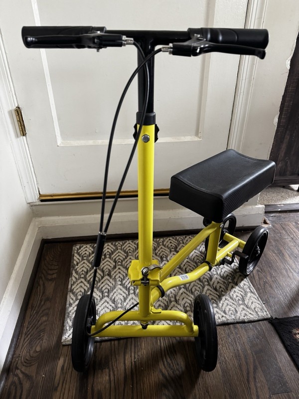 Yellow & Black 4-Wheel Knee Walker Scooter Seated Mobility with Handlebars.