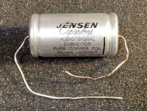 JENSEN 0.1uF 630V CAPACITOR. COPPER FOIL IN PAPER AND OIL. SILVER LEADOUTS. USED - Afbeelding 1 van 2