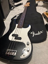 Squier Fender P-Bass 4 string electric bass guitar and Amp