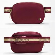 NWT Lululemon Everywhere Belt Bag 1L Burgundy/Gold Wordmark Crossbody Waist Pack