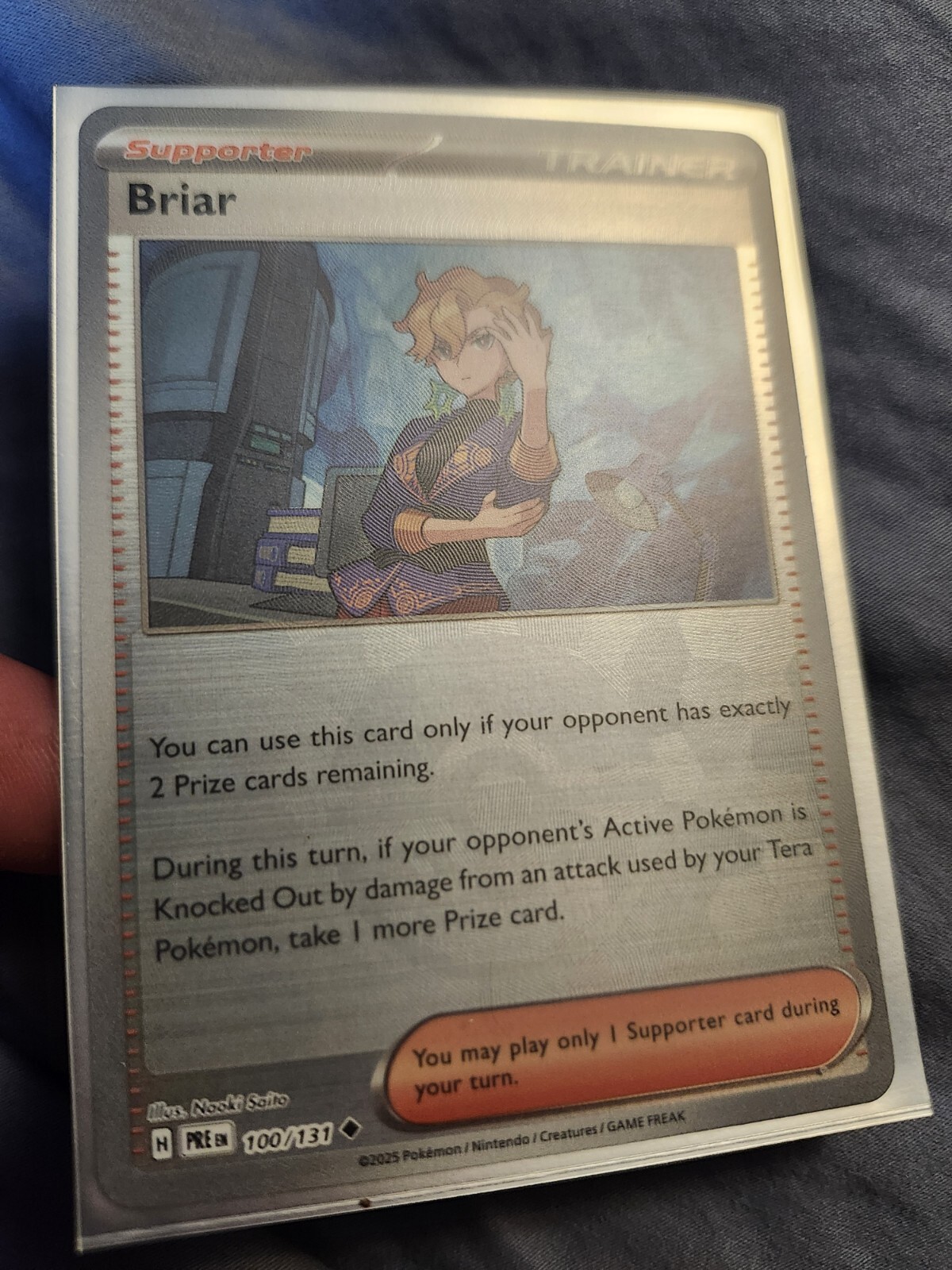 Pokemon TCG: "Briar" Poke Ball Holo LP (Prismatic Evolutions 100/131)