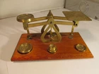 brass and wooden postage scales