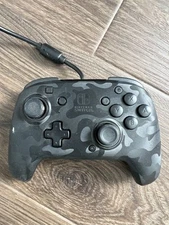 PDP - Faceoff Deluxe + Audio Wired Black Camo Controller (500-134-NA-CM00)